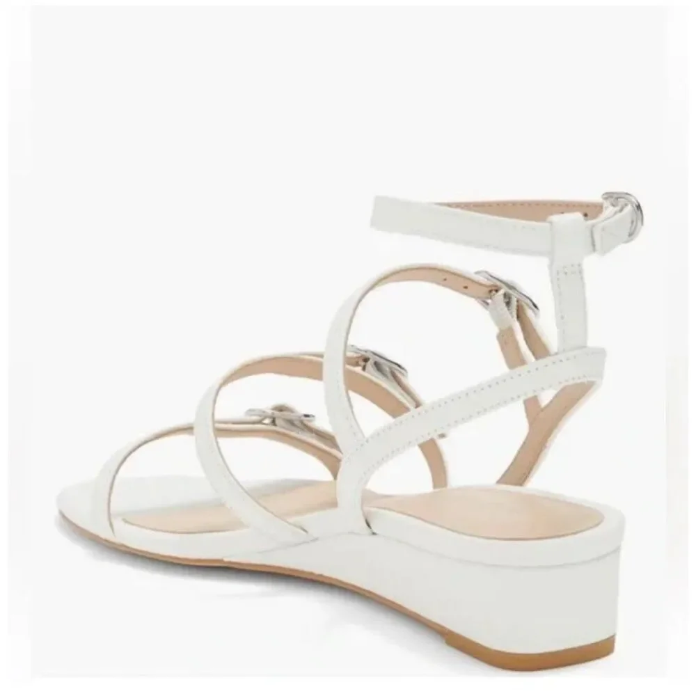 STUART WEITZMAN Grecian Buckle Wedge Sandal In White leather size 7.5 NWB